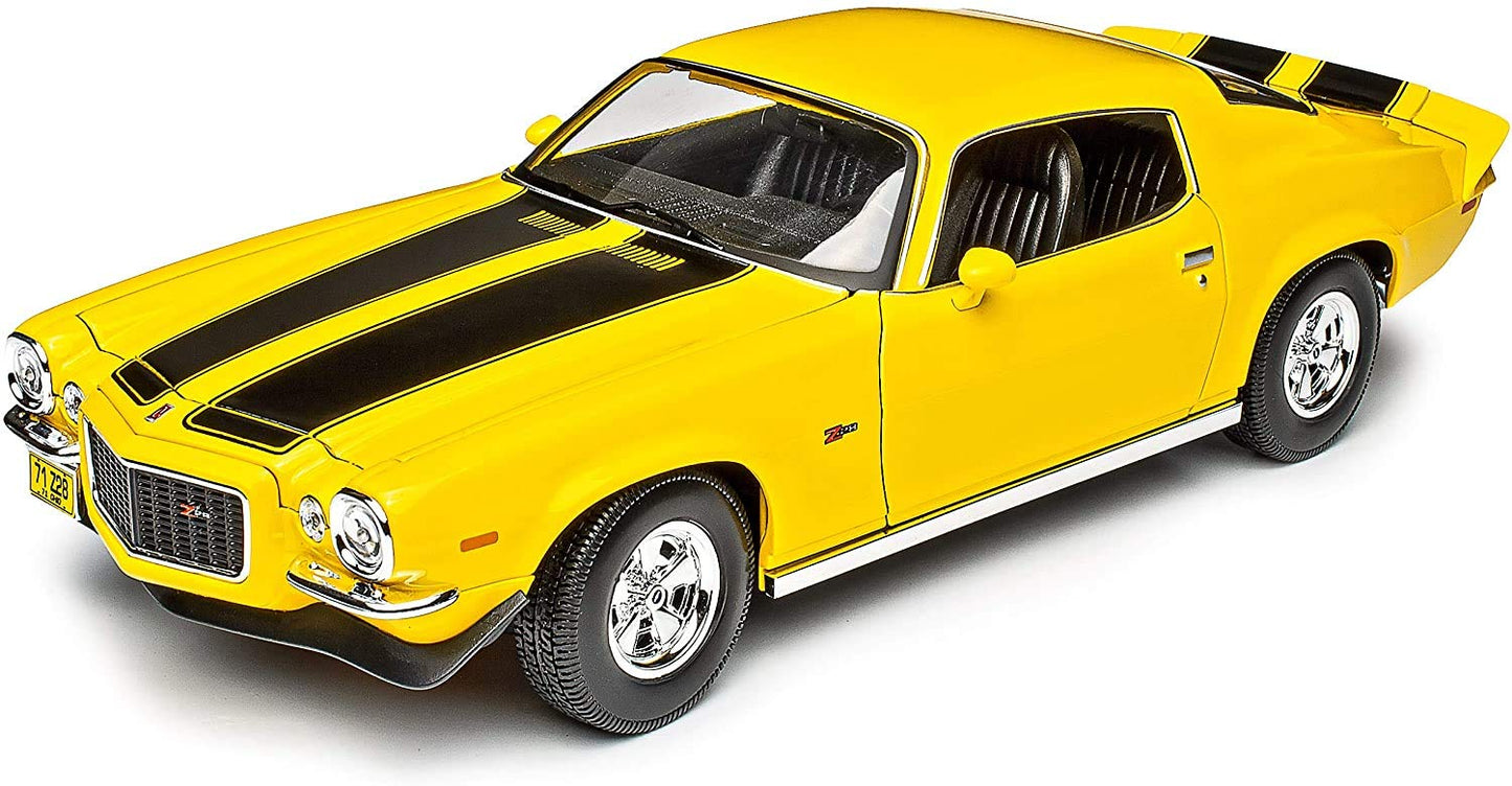 Yellow muscle car with black stripes on a white background