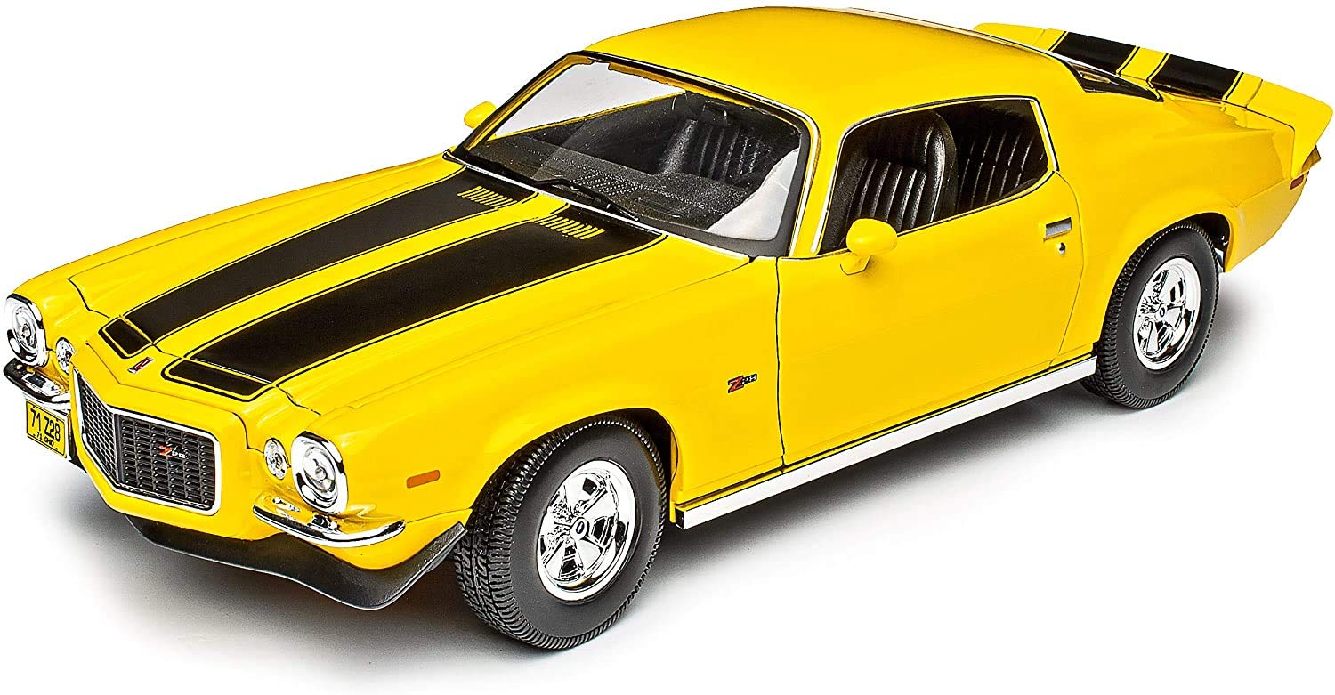 Yellow muscle car with black stripes on a white background